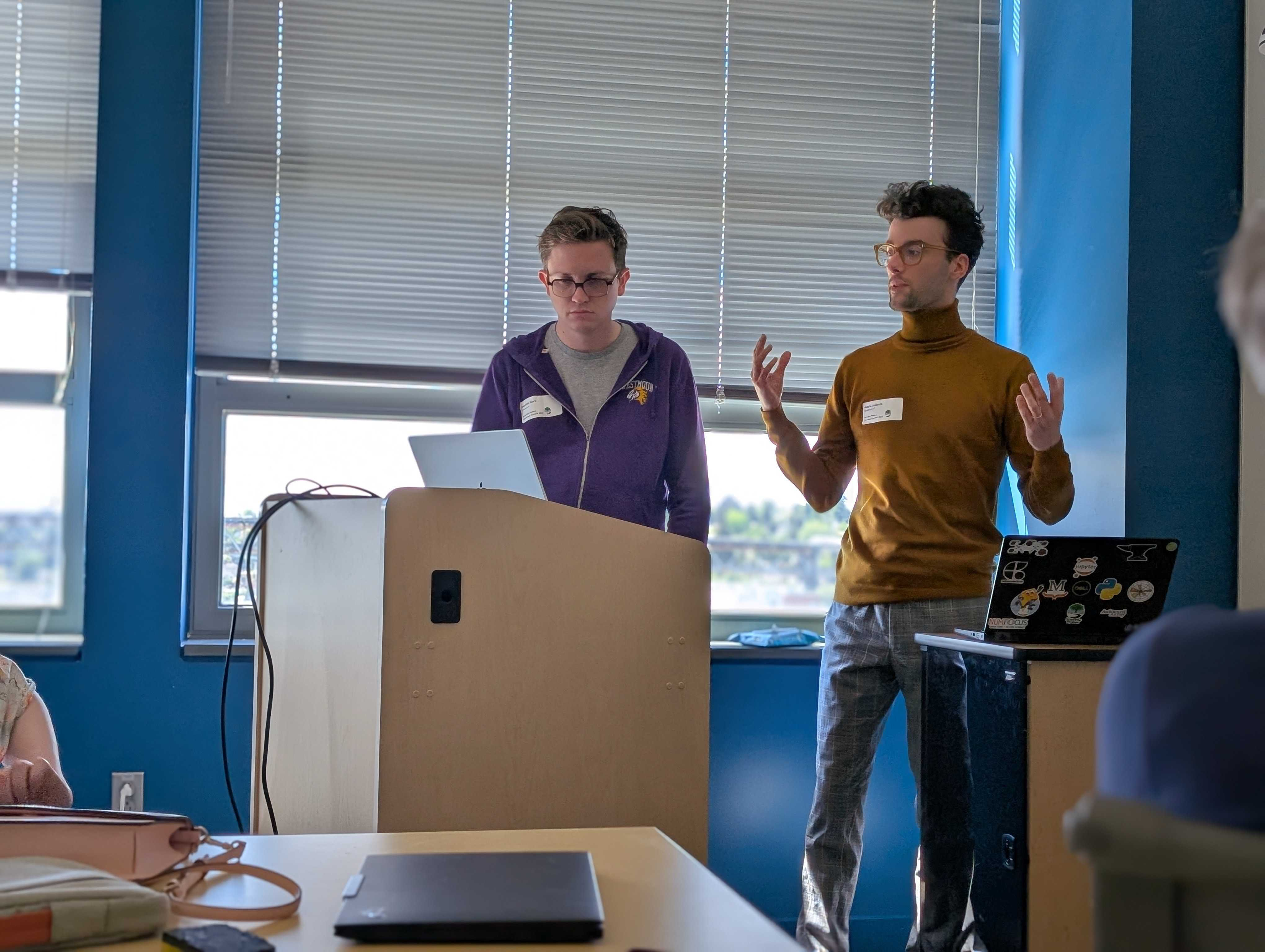 Angus and Franklin talking with the Scientific Python Developer Summit attendees about the Jupyter Book project and the exciting new features in Jupyter Book 2.